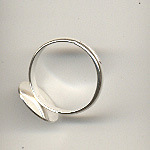 Ring with adjustable opening and round plate
